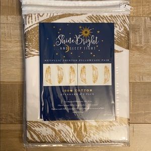 NWOT “Shine Bright” Gold Feather pillowcases